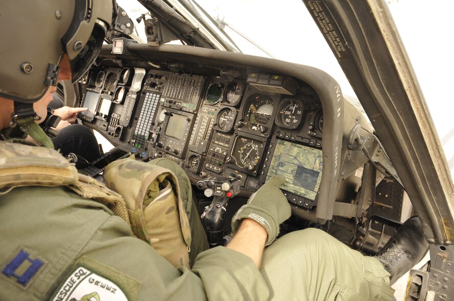 New smart multi-function color displays (SMFCD) are installed on HH-60G Pave Hawk helicopters at the 129th Rescue Wing, Moffett Federal Airfield, Calif., Sept 13, 2010.  (Air National Guard photo by Tech. Sgt. Ray Aquino)