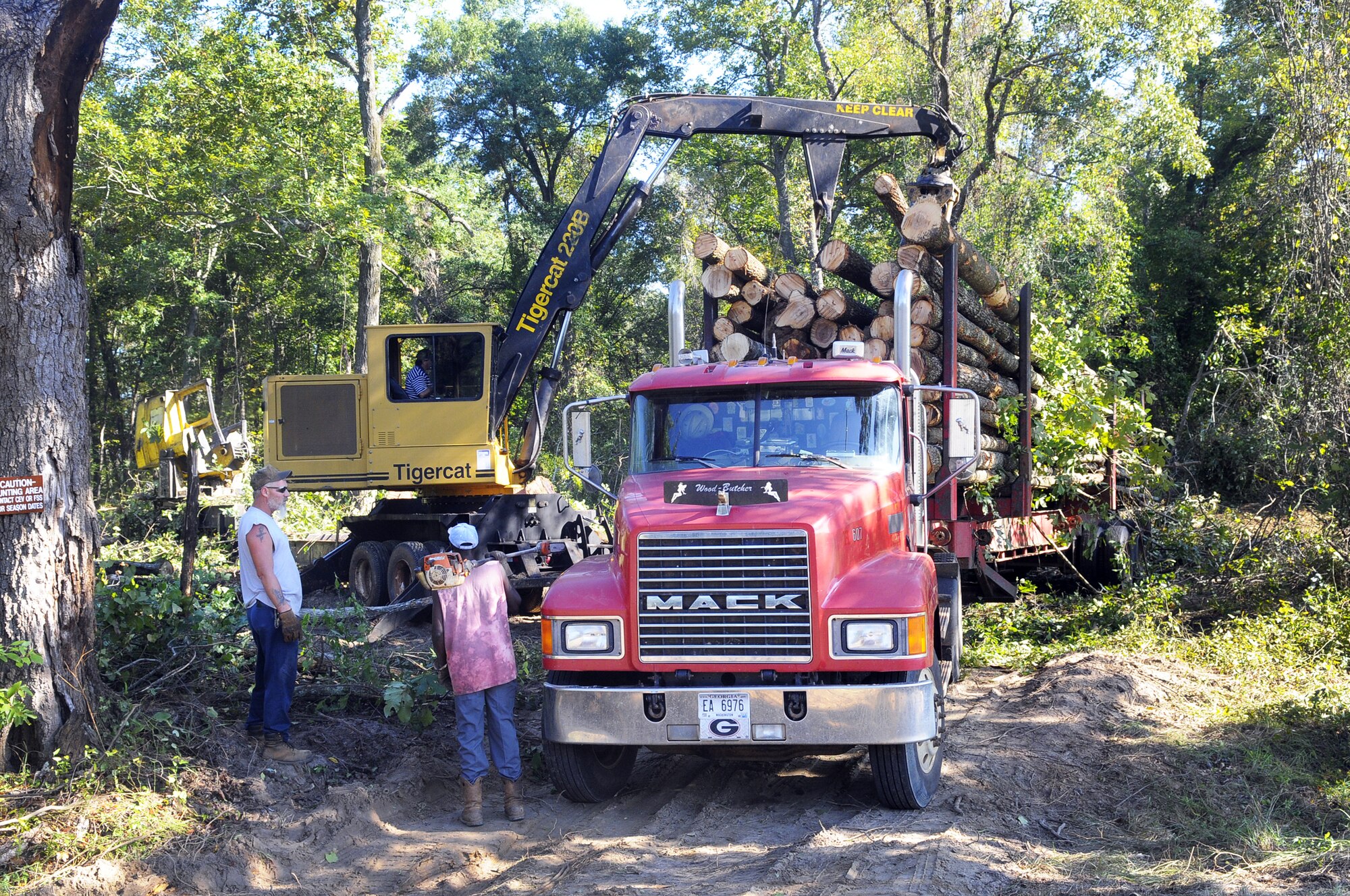 Workers from Oconee River Logging clear out the area near the intersection of Macon Street and Marchbanks Road that will become the new storage area for the Museum of Aviation.  U. S. Air Force photo by Sue Sapp