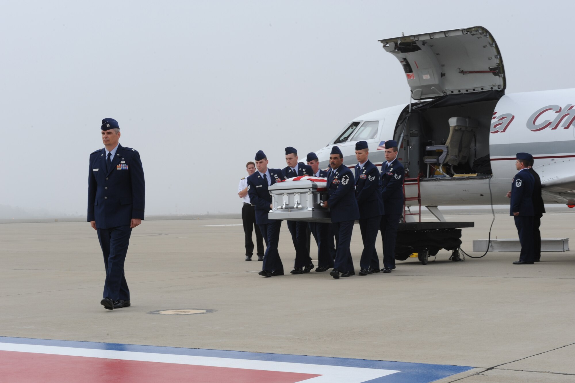 VANDENBERG AIR FORCE BASE, Calif. -- Members of the of 30th Civil Engineer Squadron Explosive Ordnance Disposal Flight here carry Senior Airman Daniel Johnson, their fallen brother in arms, to a hearse here Wednesday, Oct. 13, 2010. Airman Johnson, an EOD technician, was killed in the line of duty Tuesday, Oct. 5, 2010, in Hendu, Kandahar, Afghanistan. (U.S. Air Force photo/Senior Airman Stephanie Longoria)