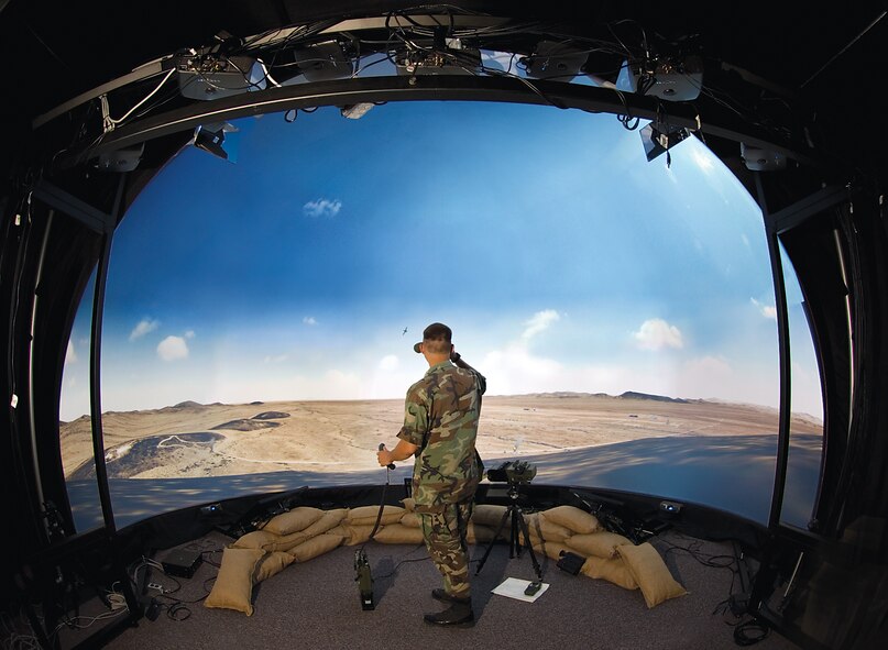 A combat controller searches for targets while immersed in the Joint Terminal Attack Control Training and Rehearsal System's live-virtual-constructive environment. (Air Force photo by Gina Cinardo, 711 HPW)