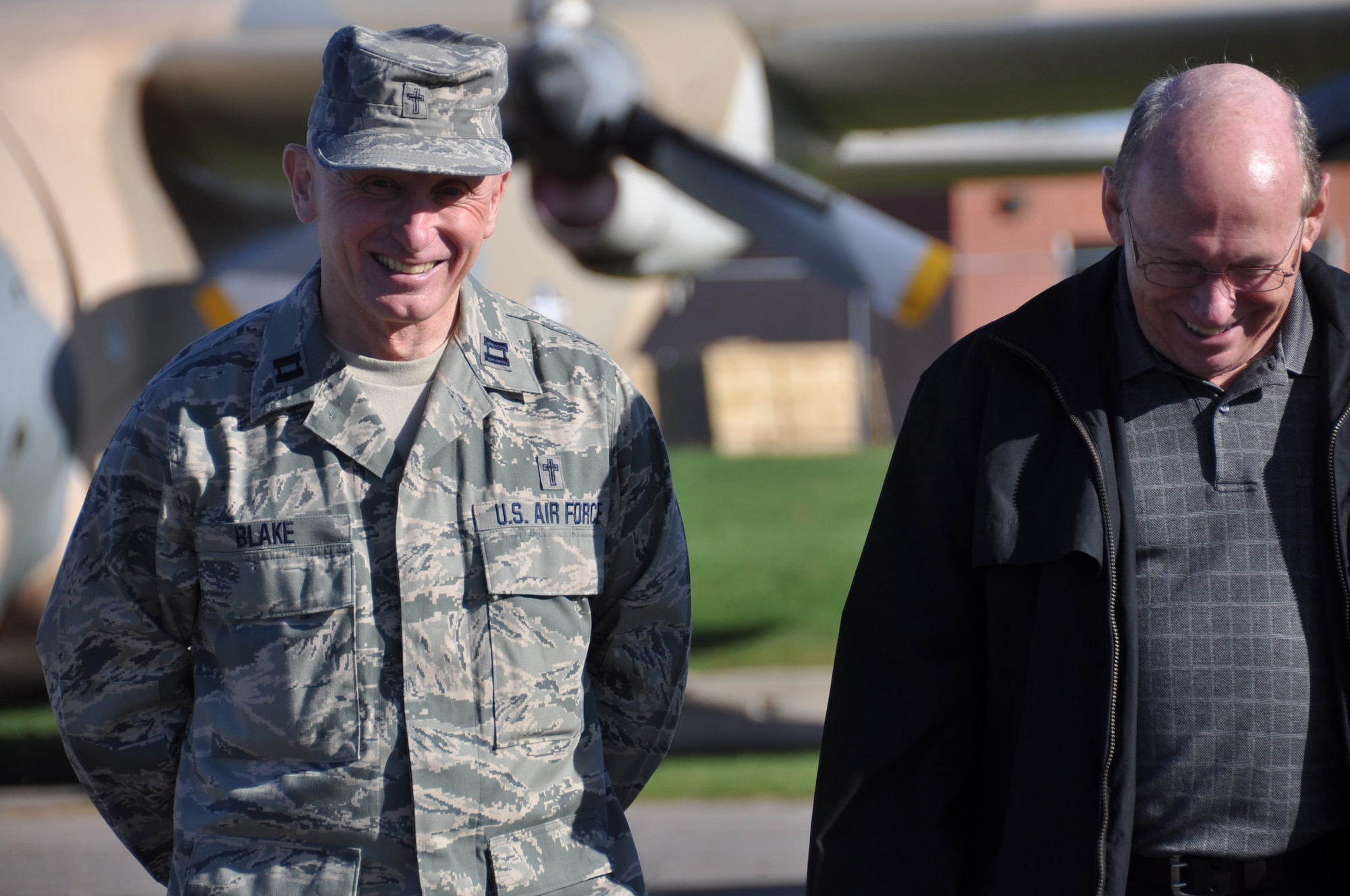 Chaplain (Capt.) Larry Blake, 934th Airlift Wing chaplain, talks with Richard Roy during Clergy Day Oct. 13. (Air Force Photo/Paul Zadach)