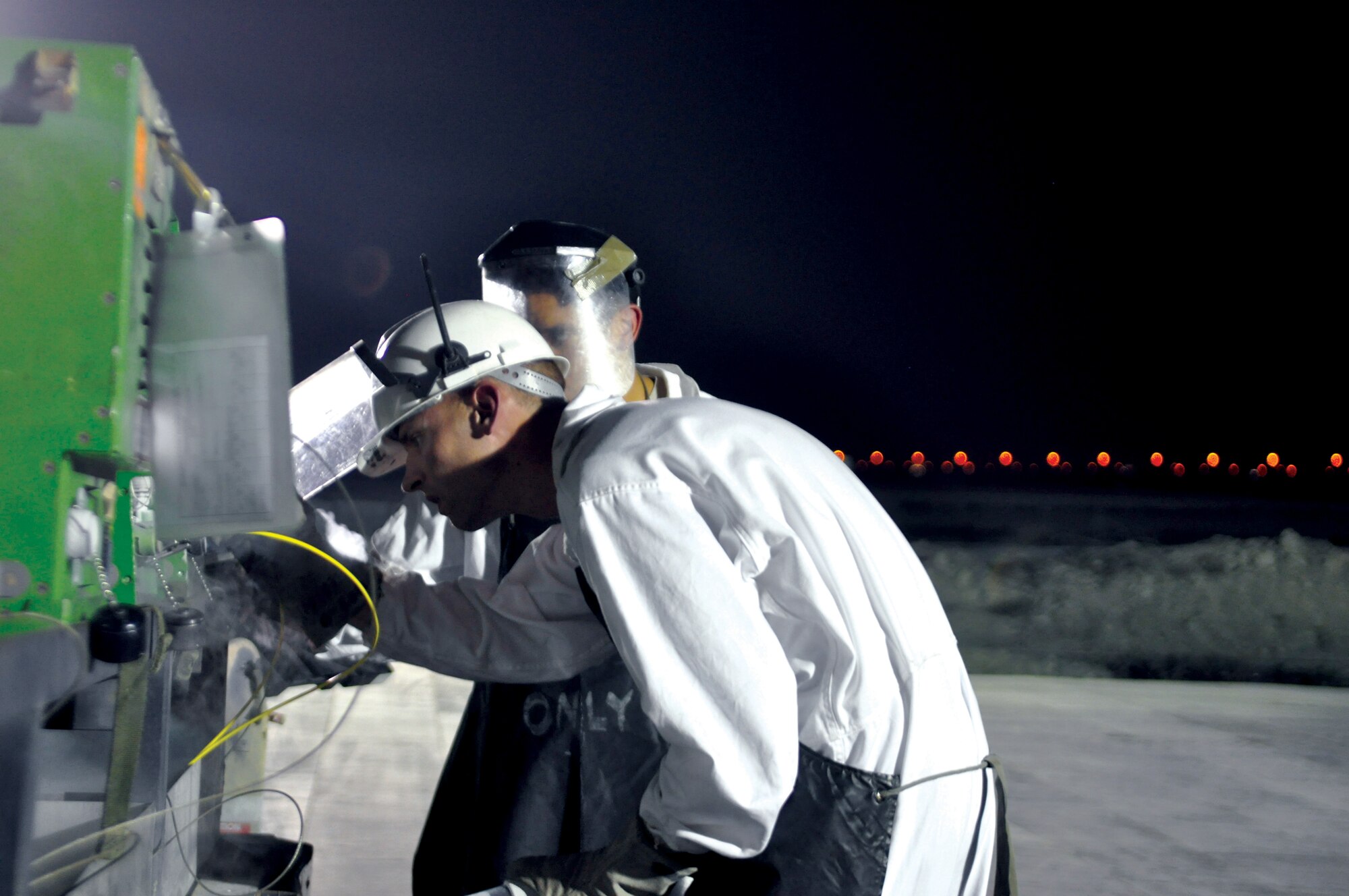 Airman White and Staff Sgt. Joel Halpin visit with the cryogenics shop to test their critical care oxygen machines. The machines are used during medical evacuations for patient care. (U.S. Air Force photos/Staff Sgt. Nika Glover).