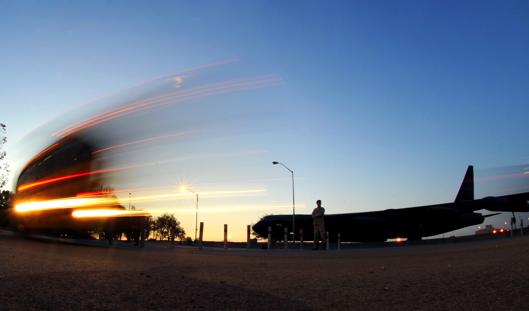509th Security Forces Squadron members check ID?s as several Airmen and civilian personnel enter Whiteman?s Arnold gate, early in the morning Oct. 7, 2010. Starting October 18th traffic delays will increase as one of two construction phases will begin to replace the speed breakers entering and exiting the Spirit gate. (U.S. Air Force photo by Senior Airman Kenny Holston)(Released)      

