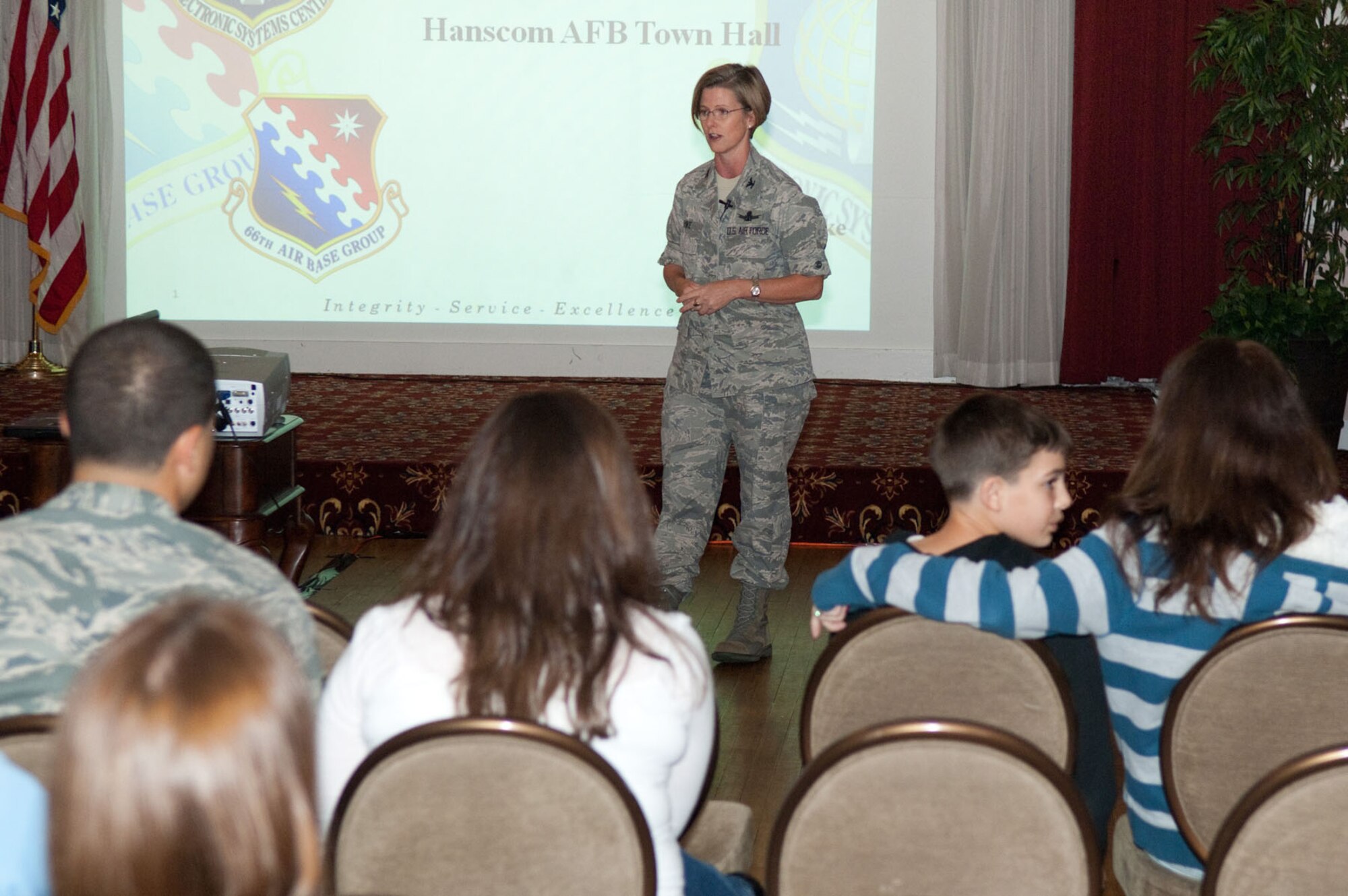 HANSCOM AIR FORCE BASE, Mass. – Col. Stacy L. Yike, 66th Air Base Group commander, welcomes the crowd to the town hall meeting on Oct. 6 at the Minuteman Club. Traffic safety, civil engineering and housing were hot topics of discussion during Colonel Yike’s first town hall meeting since assuming command of the air base group. (U.S. Air Force photo by Rick Berry)