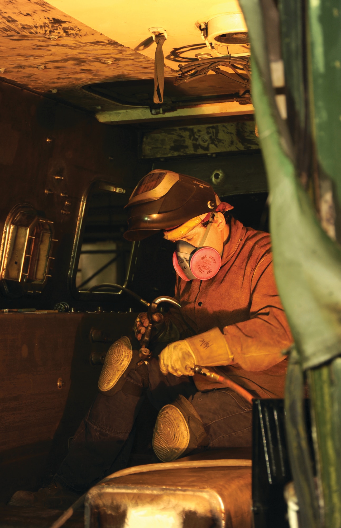 Kyle Thomas, BDRF welder, welds the inside of a battle damaged Stryker.
Welders are required to have 12 certifications, ensuring they are prepared to handle
the extensive work required in the rebuilding process.