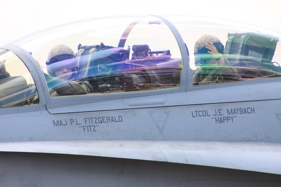 Maj. Jeremy Wall and Capt. Nicole Jansen- HinnenKamp, Marine All-Weather Fighter Attack Squadron 224 pilots, prepare to take off for a basic fighter maneuver flight training exercise during exercise PHIBLEX 11 here Oct. 15.