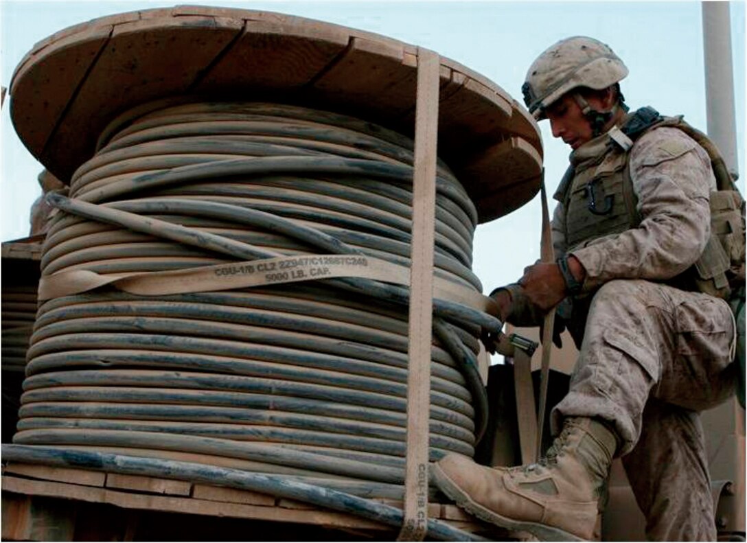 Sgt. Christopher Witte, a chemical, biological, radiological and nuclear defense specialist, with 2nd platoon, Motor Transport Company A, Combat Logistics Battalion 3, 1st Marine Logistics Group (Forward), provides security as part of a long security halt during a resupply convoy, Oct. 14.