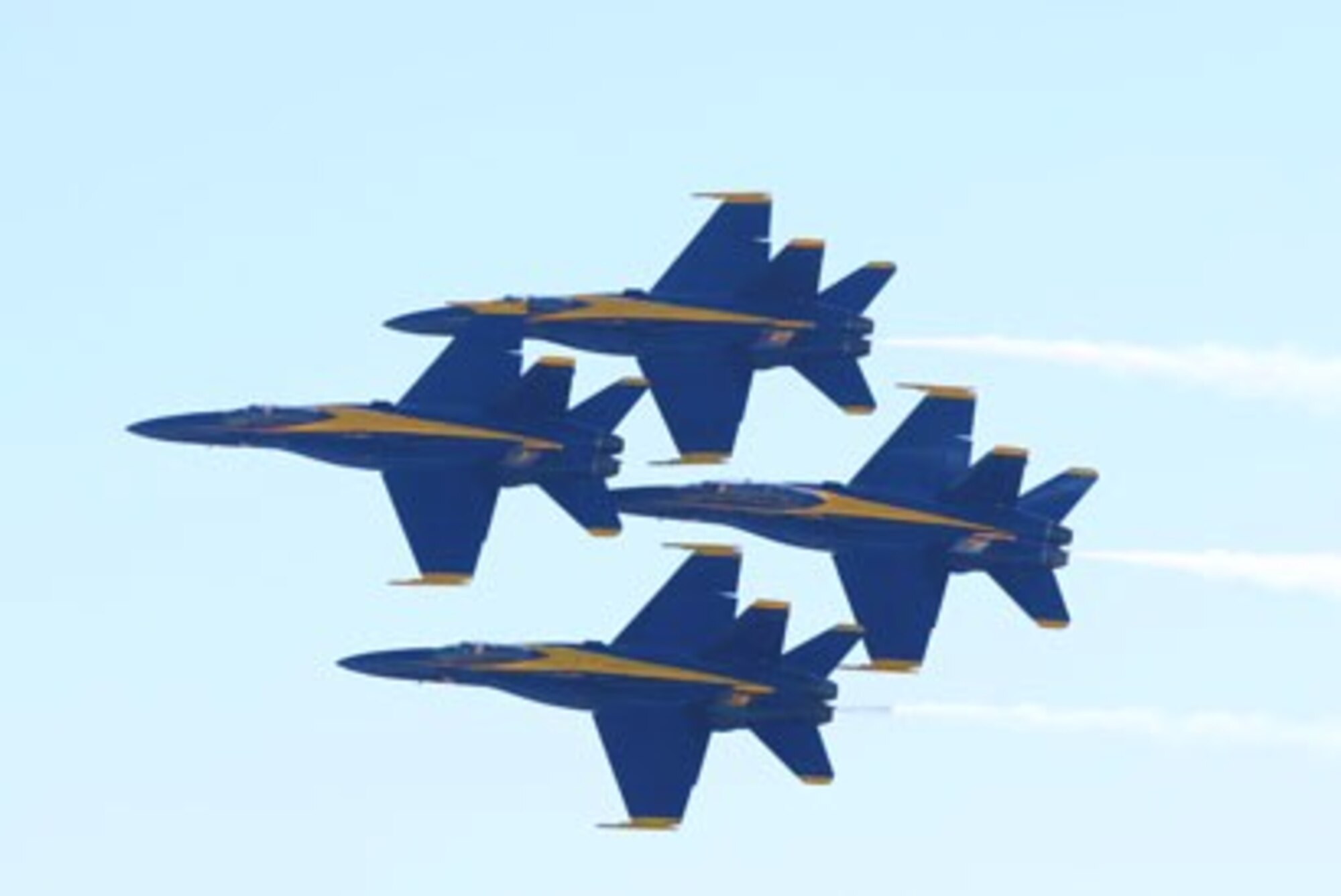 Four Blue Angel F/A-18 Hornets fly in their famous diamond formation during a practice performance on Oct. 15 before a crowd of 3000-plus spectators at Dobbins Air Reserve Base.  (U.S. Air Force Photo/Don Peek)