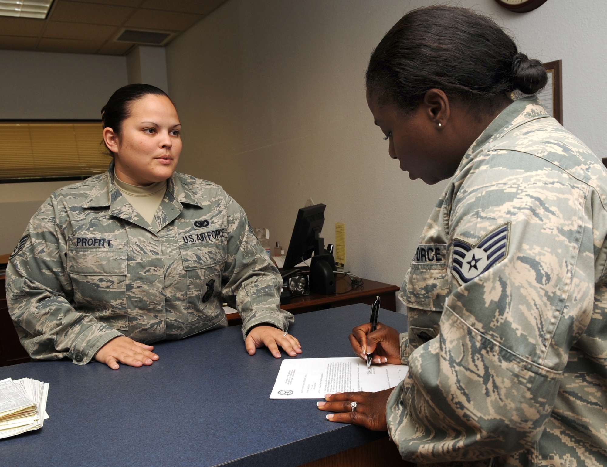 MOUNTAIN HOME AIR FORCE BASE, Idaho -- Staff SSgt’s Erin Profitt and Malissa Jackson, 366th Security Forces Squadron reports and analysis clerks, train on proper procedures on turning in a traffic ticket Sep 23. Security forces provide integrated defense and law enforcement for the base and develop highly trained Airmen to support deployed contingency operations. (U.S. Air Force photo by Senior Airman Roy Lynch)