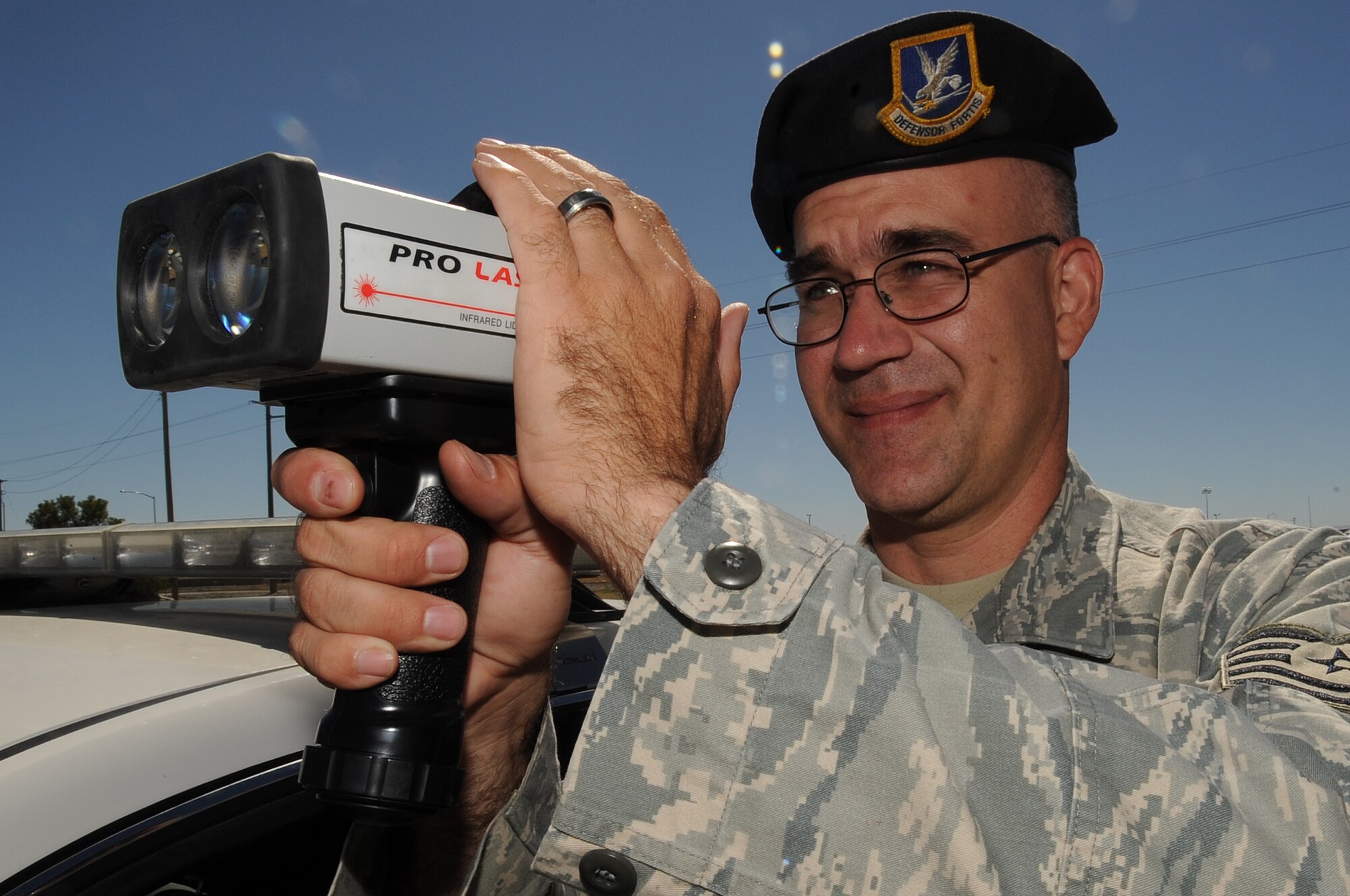 MOUNTAIN HOME AIR FORCE BASE, Idaho -- Tech Sgt Steven Svetkovich, Security Forces Squadron defender, uses a handheld radar speed detector Sep 21. Security forces provide integrated defense and law enforcement for the base and develop highly trained Airmen to support deployed contingency operations. (U.S. Air Force photo by Senior Airman Roy Lynch)