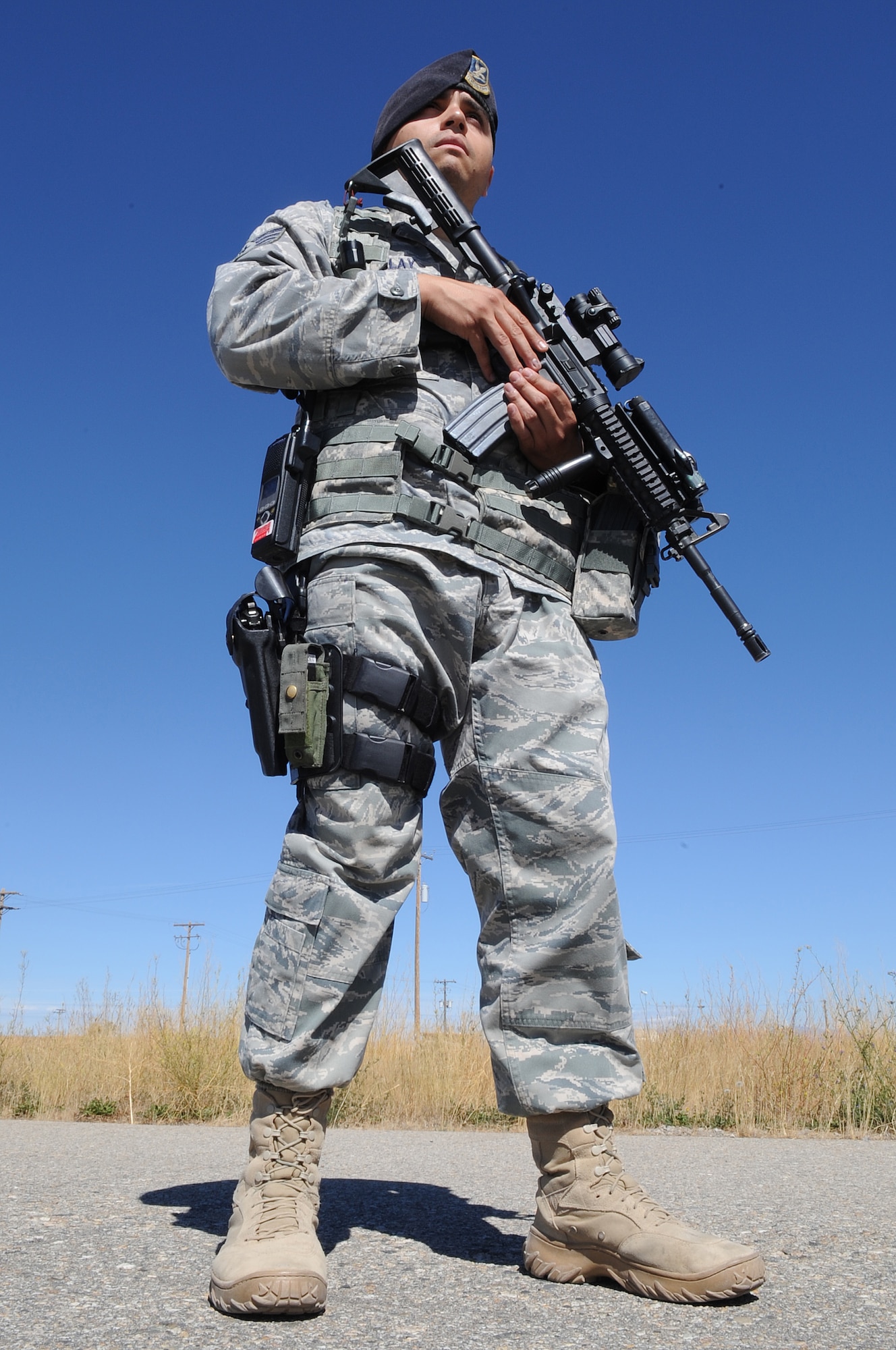 MOUNTAIN HOME AIR FORCE BASE, Idaho -- Staff Sgt Robert Palalay, Security Forces Squadron defender, stands watch on the flight line Sep 21. Security forces provide integrated defense and law enforcement for the base and develop highly trained Airmen to support deployed contingency operations. (U.S. Air Force photo by Senior Airman Roy Lynch)