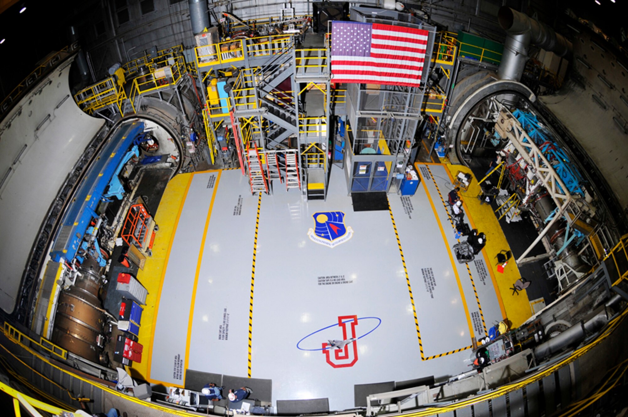The newly painted floor at J-1/J-2 clearly denotes load ratings and is emblazoned with the AEDC shield and the “Flying J” symbol. (Photo by Rick Goodfriend)
