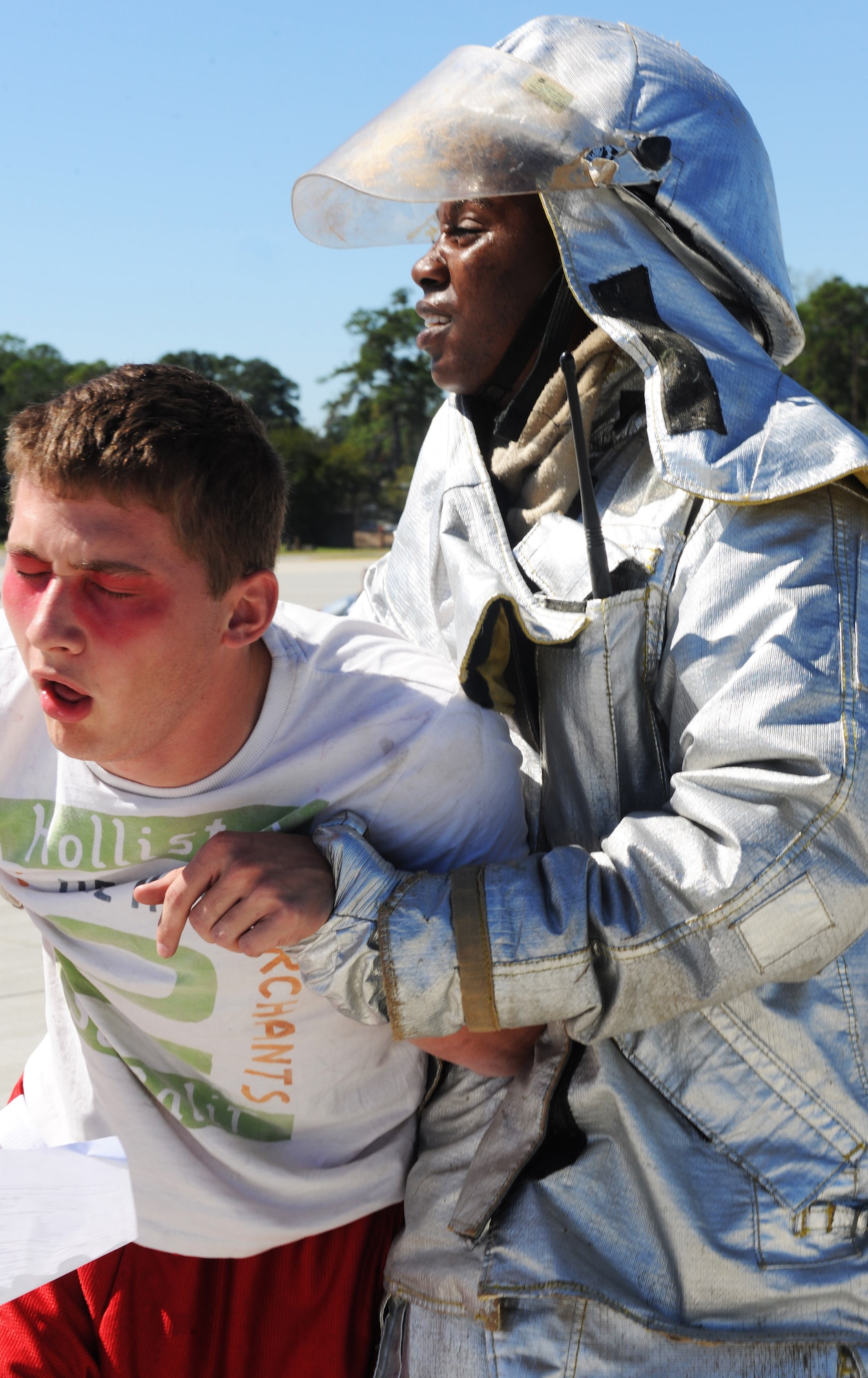 MOODY AIR FORCE BASE, Ga. -- Staff Sgt. Dwayne Peeples, 23rd Civil Engineer Squadron firefighter, carries Airman 1st Class James Mayo, 23rd Equipment Maintenance Squadron munitions, to an injury checkpoint during a Major Accident Response Exercise held here Oct. 15. Members like Airman Mayo acted as a victim to help responders carry out a realistic approach. (U.S. Air Force photo/Airman 1st Class Benjamin Wiseman)