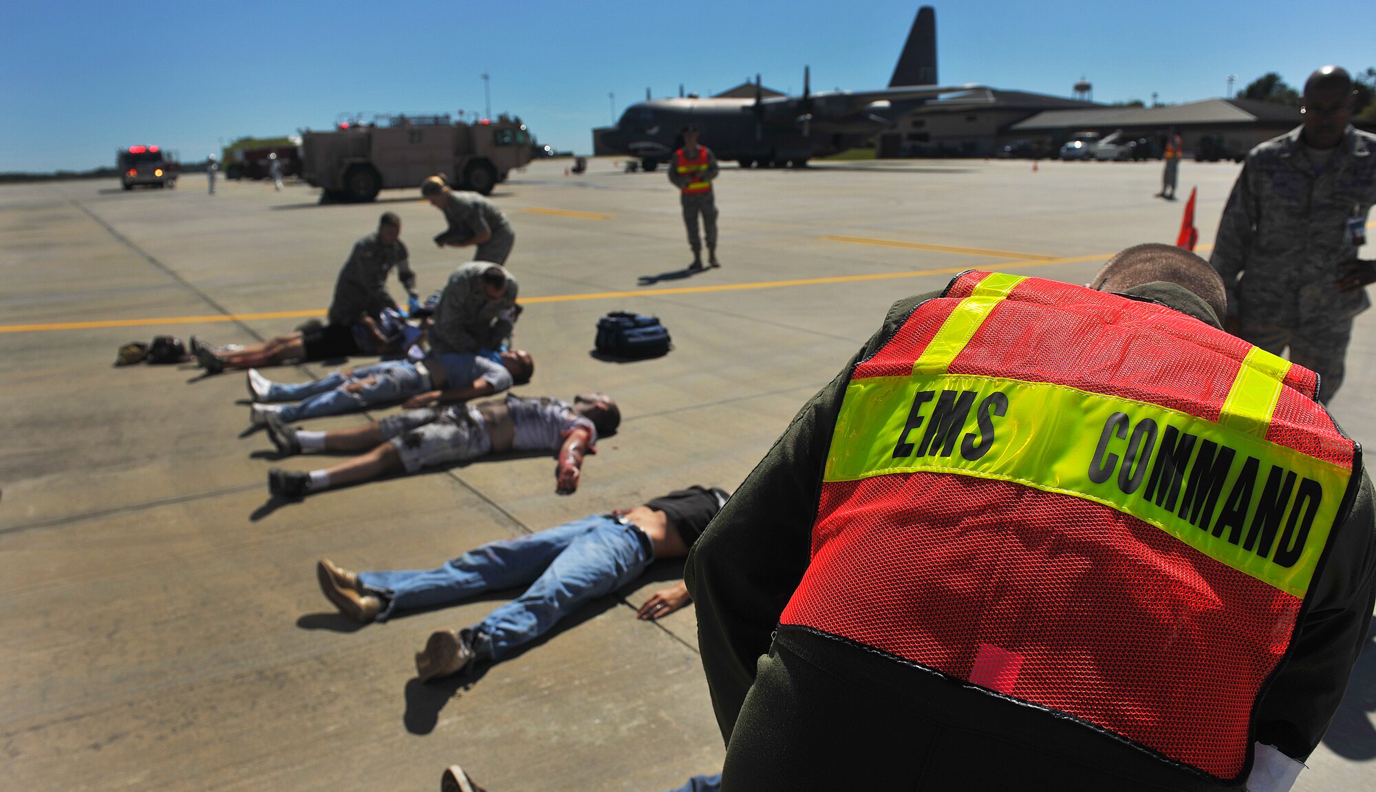 MOODY AIR FORCE BASE, Ga. -- Members from the 23rd Medical Support Squadron come to the aid of moulage victims during a Major Accident Response Exercise here Oct. 15. Along with the 23rd MDG, other on- and off-base agencies responded to the exercise to provide support. (U.S. Air Force photo/Airman 1st Class Joshua Green)
