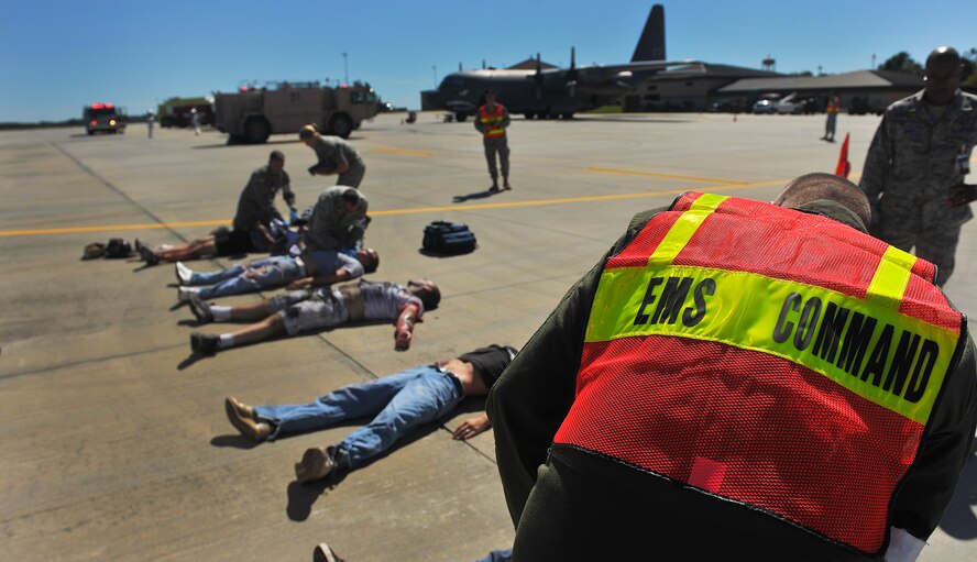 MOODY AIR FORCE BASE, Ga. -- Members from the 23rd Medical Support Squadron come to the aid of moulage victims during a Major Accident Response Exercise here Oct. 15. Along with the 23rd MDG, other on- and off-base agencies responded to the exercise to provide support. (U.S. Air Force photo/Airman 1st Class Joshua Green)
