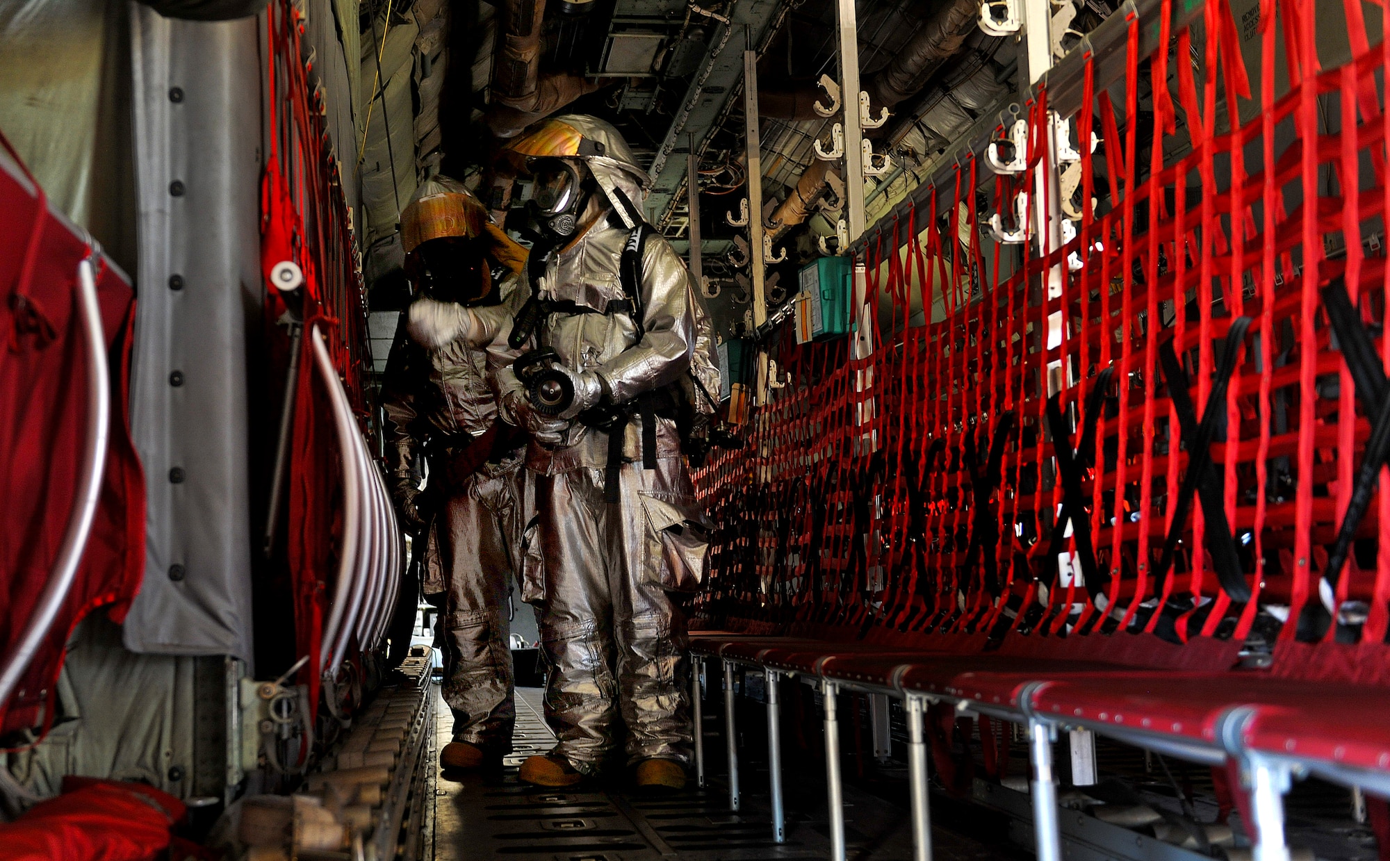 MOODY AIR FORCE BASE, Ga. -- Airmen from the 23rd Civil Engineer Squadron emergency services flight clear an HC-130P Combat King during a Major Accident Response Exercise here Oct. 15. The Airmen helped respond to put out the simulated fire within and around the aircraft as well as clear victims from the site.
(U.S. Air Force photo/Airman 1st Class Joshua Green)
