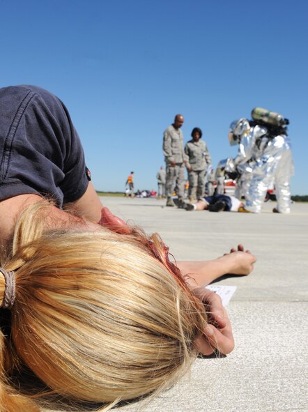 MOODY AIR FORCE BASE, Ga. -- An exercise victim lies on the runway and awaits help during a Major Accident Response Exercise held here Oct. 15. The fire department, along with medical personnel, hurried to treat and evacuate all injured personnel during the exercise. (U.S. Air Force photo/Airman 1st Class Benjamin Wiseman)