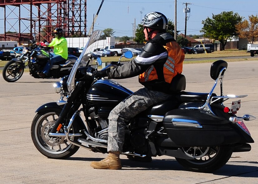 DYESS AIR FORCE BASE, Texas—Airmen from the 317th Airlift Group partake in their Commander’s motorcycle safety awareness ride, here Oct. 14. The members began their ride on base and rode 46 miles to enhance their skills in group and individual riding. (U.S. Air Force photo/Airman 1st Class Chelsea Cummings)