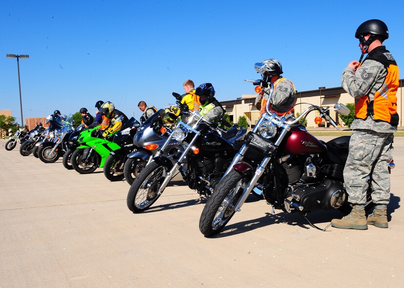 DYESS AIR FORCE BASE, Texas—Airmen from the 317th Airlift Group partake in their Commander’s motorcycle safety awareness ride, here Oct. 14. The members began their ride on base and rode 46 miles to enhance their skills in group and individual riding. (U.S. Air Force photo/Airman 1st Class Chelsea Cummings)