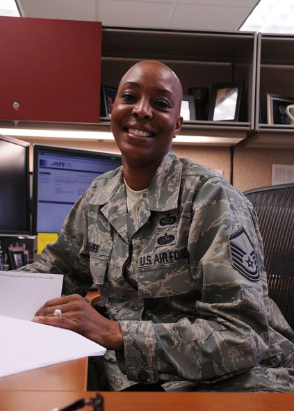 MacDill Air Force Base, Fla. --  Meet Master Sgt. Kathy McNeil, chief of the retention program here at the 927 Air Refeuling Wing.  It is McNeil's job to educate airmen about career opportunities with the 927th and with the Air Force.  The 24-year Air Force veteran and native of Tuscon, Ariz, says the best part of her job is educating airmen about career options and education benefits.  She says "If you have any questions about how to keep your career going, I'm the person to talk to." (Official United States Air Force photo by Staff Sgt. Shawn C. Rhodes)