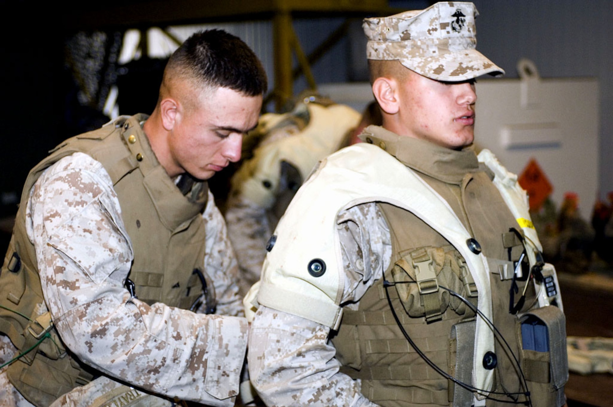 Marines prepare to enter a mock Afghan village setup at the Infantry Immersion Trainer at Camp Pendleton, Calif. The exercise was part of a U.S. Joint Forces Command joint capability technology demonstration that closely simulated battlefield conditions.  (U.S. Army photo/Sgt. Josh LeCappelain) 