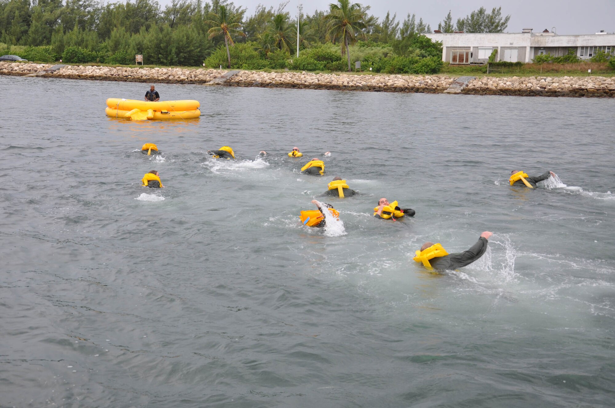 WRIGHT-PATTERSON AIR FORCE BASE, Ohio – Airmen from the 445th Airlift Wing swim to a survival raft during a simulated aircraft water landing.  More than 75 reservists from the wing performed their semi-annual water survival training requirements at the Naval Air Station in Key West, Fla., Oct. 14. (U.S. Air Force photo/Staff Sgt. Robert Nelson)