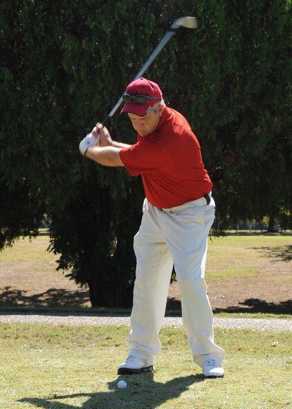 BARKSDALE AIR FORCE BASE, La. -- Gary Blake, 2nd Force Support Squadron, swings his club during the first Best of the Wing Golf Scramble Oct. 14. Col. Tim Fay, 2nd Bomb Wing commander, held the tournament to determine which squadron has the best golf team. (U.S. Air Force photo/Airman 1st Class Sean Martin)(Released)