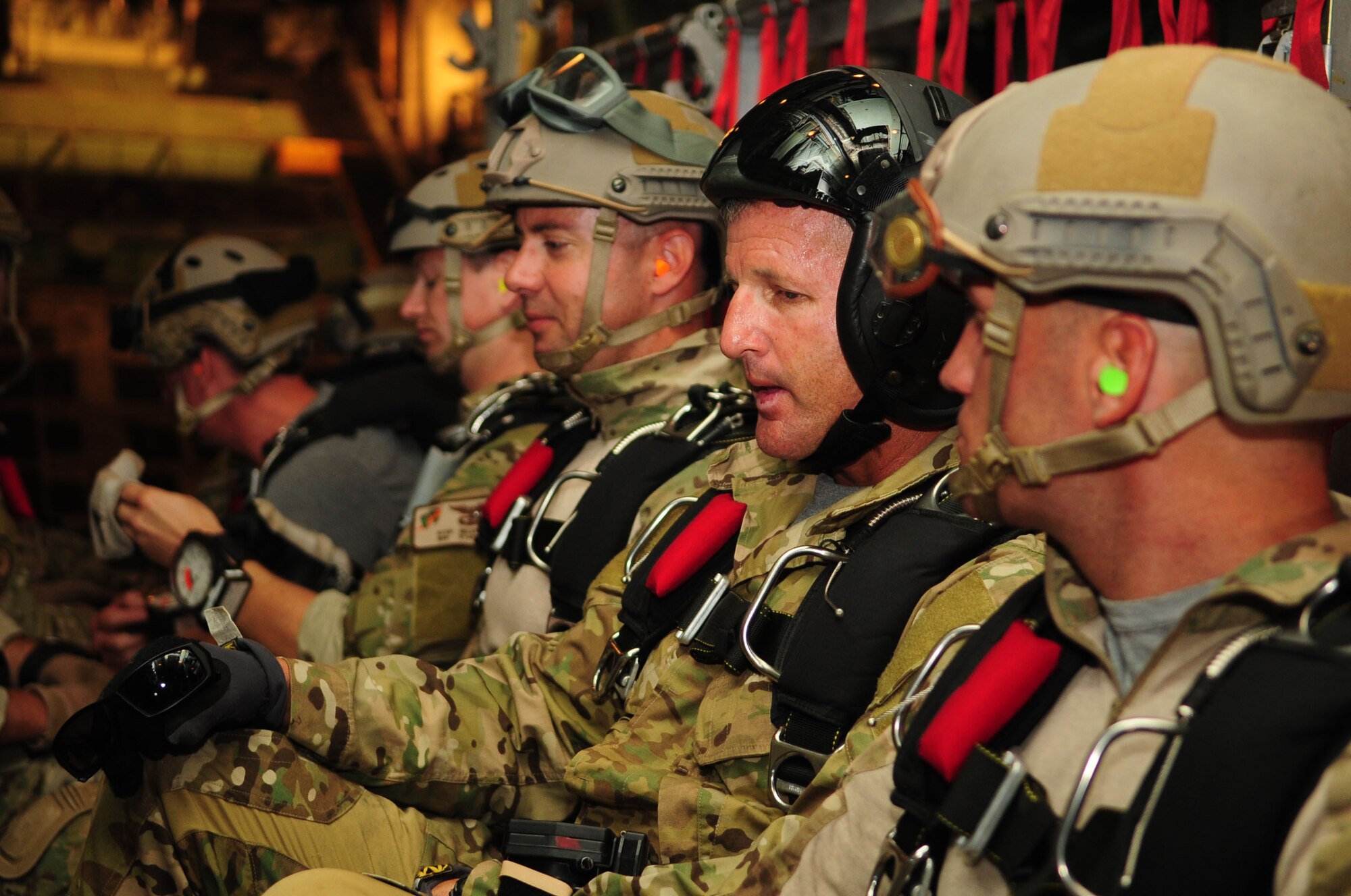 DAVIS-MONTHAN AIR FORCE BASE, Ariz. - Pararescuemen aboard a C-130 Hercules stand by as they approach their parachute drop zone here Oct. 9, 2010. (U.S. Air Force photo/Airman 1st Class Jerilyn Quintanilla)