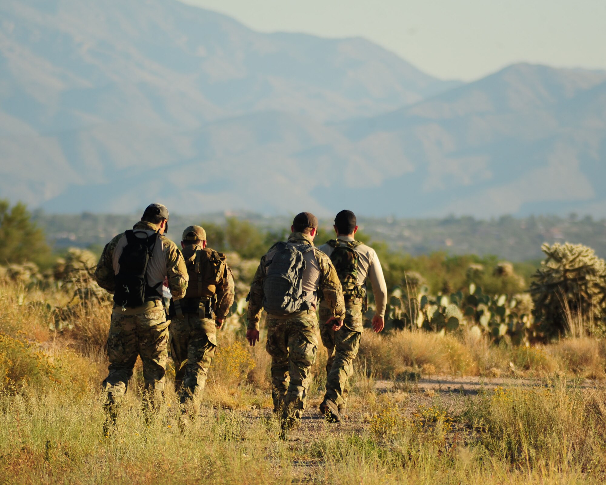 DAVIS-MONTHAN AIR FORCE BASE, Ariz. - Pararescuemen from the 212th Rescue Squadron based in Anchorage, Alaska, embark on an eight-mile land navigation challenge as part of the bi-annual PJ Rodeo competition here Oct 7, 2010. (U.S. Air Force photo/Airman 1st Class Jerilyn Quintanilla)