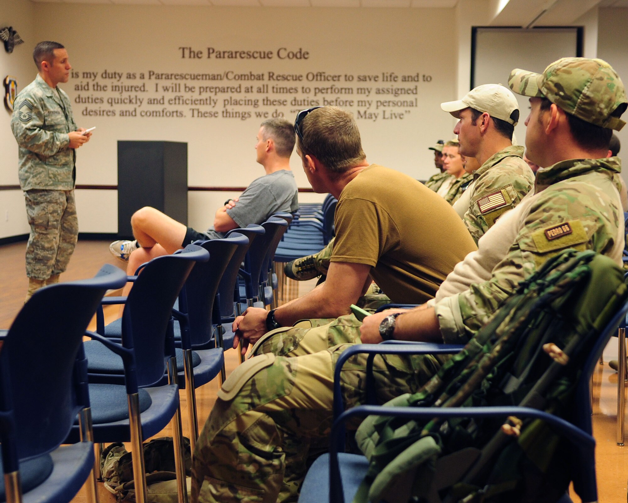 DAVIS-MONTHAN AIR FORCE BASE, Ariz. - Chief Master Sgt. Charles Stiefken, 48th Rescue Squadron superintendent, briefs pararescuemen participating in the bi-annual PJ Rodeo competition at the 48th RQS here Oct. 7, 2010. (U.S. Air Force photo/Airman 1st Class Jerilyn Quintanilla)