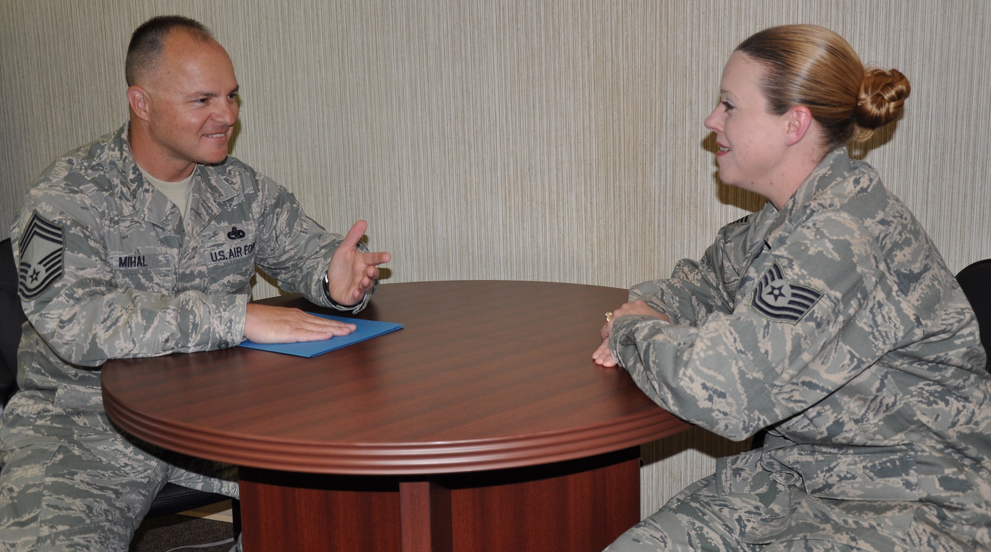 Chief Master Sgt. Stephen Mihal (left), the superintendent for the 82nd Training Group talks with Tech. Sgt. Jennifer Headrick Oct. 14 about becoming an instructor at the Sheppard NCO Academy that is scheduled to begin its first class in mid-March. Chief Mihal was selected to serve as the academy's first commandant. (U.S. Air Force photo/John Ingle)