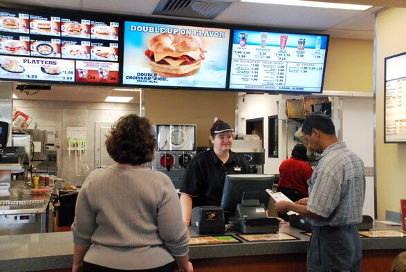 Shoppers enjoy ordering from the newly renovated Burger King on base during the grand reopening Tuesday here at F.  E. Warren Air Force Base. The eatery has been newly renovated with over $870,000 worth of upgrades.  
“Advertisements contained herein do not constitute an endorsement by the Department of Defense, Department of the Air Force or F. E. Warren AFB.” (U.S. Air Force photo by 1st Lt. Brooke Brzozowske) 
