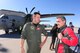 Lt. Col. Mike Depree, of the 119th Operations Group, greets Massimo Trocino, as Tracino lands in a C-27 J Spartan aircraft Oct 14, at Hector International Airport in preparation for a familiarization tour being conducted Friday, Oct. 15, by L-3 Platform Integration, Alenia North America, and the companies' joint venture, Global Military Aircraft Systems (GMAS), at the North Dakota Air National Guard, Fargo N.D.  The familiarization tour is to help unit members of the North Dakota Air National Guard get acquainted with their future aircraft and planned mission transition scheduled to begin in 2013.  The media is also invited to the NDANG to take a look at the new aircraft. The C-27J is a mid-range, multifunctional and interoperable aircraft able to perform logistical re-supply medical evacuation, troop movement, airdrop operations, humanitarian assistance and homeland security missions for the U.S. Air Force. The C-27J is essential to the U.S. Air Force's ability to provide on-demand transport of time-sensitive/mission-critical cargo and key personnel to forward deployed units.