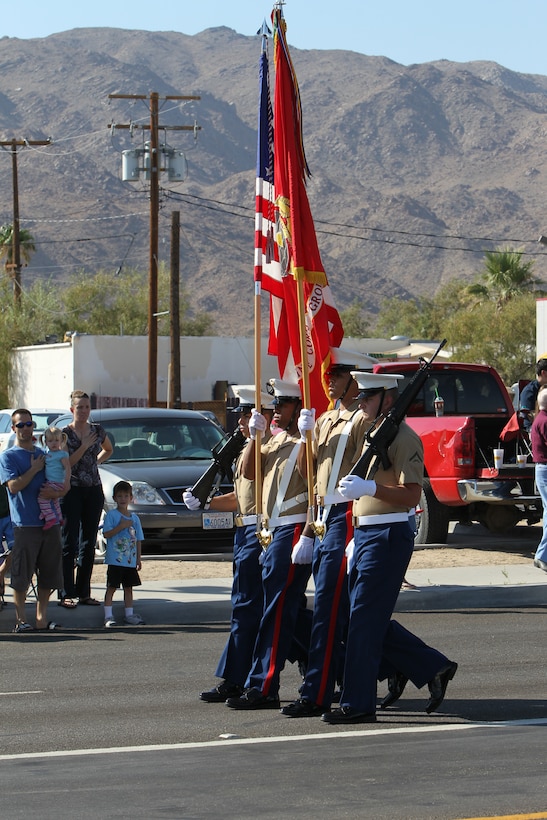 Marines with the Combat Centers Color Guard lead the 74th annual Pioneer Days Parade in Twentynine Palms, Calif., Saturday.::r::::n::