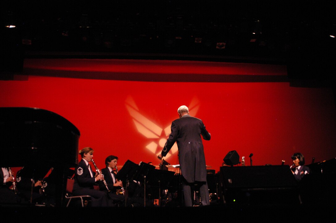 The USAF Academy Band performed on October 15, 2010, at Central Arizona College in Coolidge, Arizona, to a packed house. Featured in this photo are Master Sergeants Noelle Little and Heike Gazetti, clarinet, Lieutenant Colonel Larry H. Lang, Commander and Conductor of the USAF Academy Band, and Technical Sergeant Monica Ding, oboe and English horn.