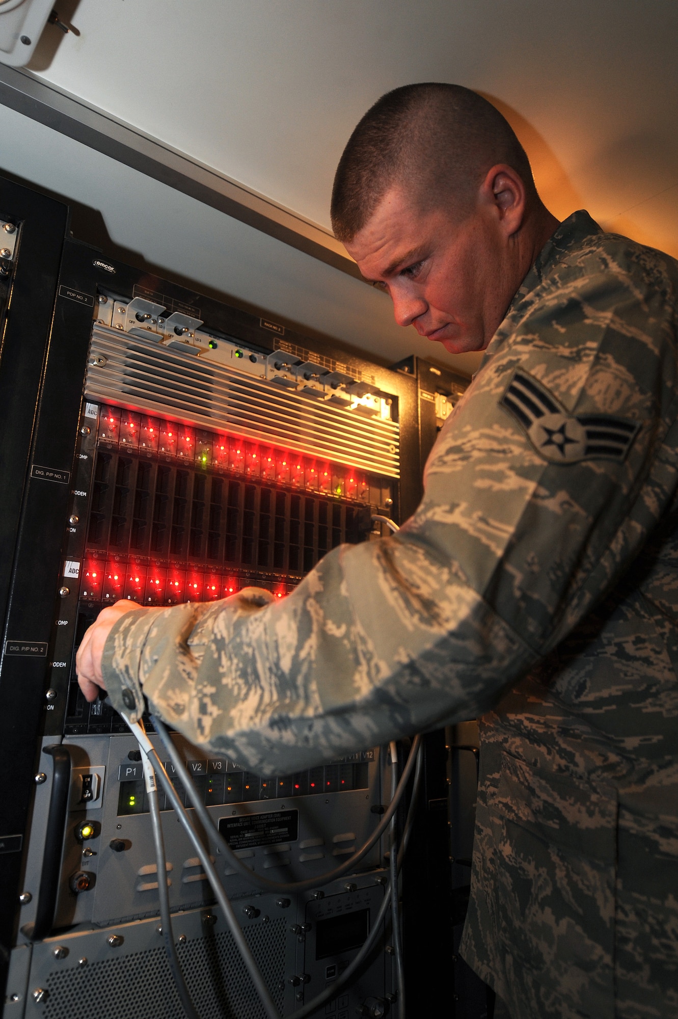 Senior Airman Kirk Martin inputs a patch to troubleshoot a radio, Oct. 14, 2010, at Kandahar Airfield, Afghanistan. Airman Martin, from Shreveport La., is a radio frequency transmission systems journeyman with the 73rd Expeditionary Air Control Squadron. (U.S. Air Force photo by Tech. Sgt. Chad Chisholm/Released)