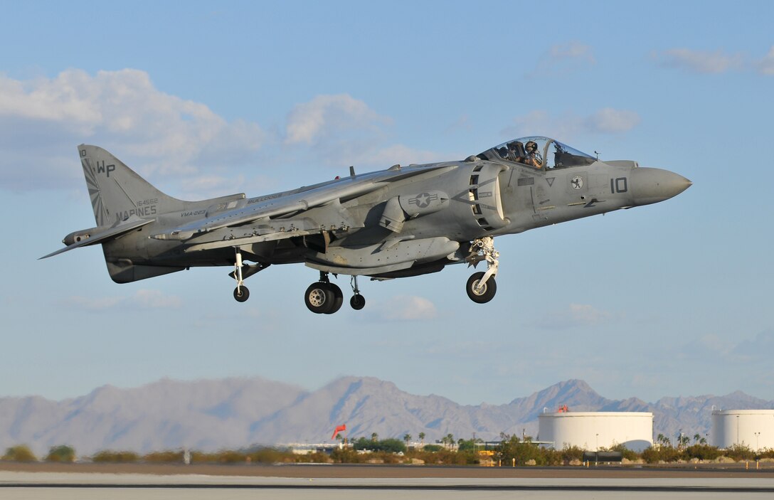 Participating in the semiannual Weapons and Tactics Instructor course, an AV-8B Harrier jet assigned to Marine Attack Squadron 223 descends for a landing on the flight line of the Marine Corps Air Station in Yuma, Ariz., on Oct. 16, 2010. WTI, hosted by Marine Aviation Weapons and Tactics Squadron 1, trains Marine students from across the globe to return to their units as training officers versed in the latest aviation tactics and procedures. VMA-223 is based at Marine Corps Air Station Cherry Point, N.C.