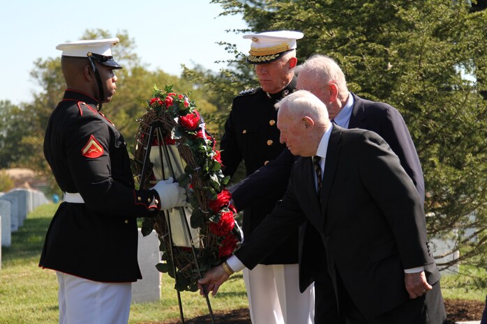Commandant of the Marine Corps, Gen. James T. Conway, with retired commandants Paul X. Kelly and Alfred M. Gray, prepare to lay a wreath next to the memorial stone and Beirut Cedar tree in section 59 of Arlington National Cemetery on Oct. 17, 2010. The laying of the wreath concluded the ceremony, leaving the reminder; those who lie buried are not forgotten.