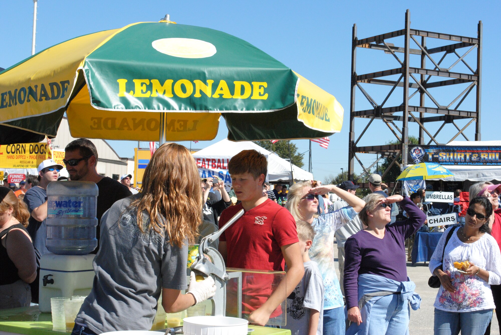 Air show spectators battled sunglare while standing in line for lemonade to avoid missing the Snowbirds' performance during the Wings Over Atlanta Air Show at Dobbins.  (U.S. Air Force photo/Master Sgt. Stan Coleman)