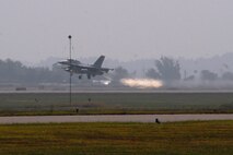 An F-16 Fighting Falcon aircraft from Kunsan Air Base, Republic of Korea, takes off during exercise Max Thunder 10-02 Oct. 18 at Kwangju Air Base, Republic of Korea. (U.S. Air Force photo/Staff Sgt. Eric Burks)