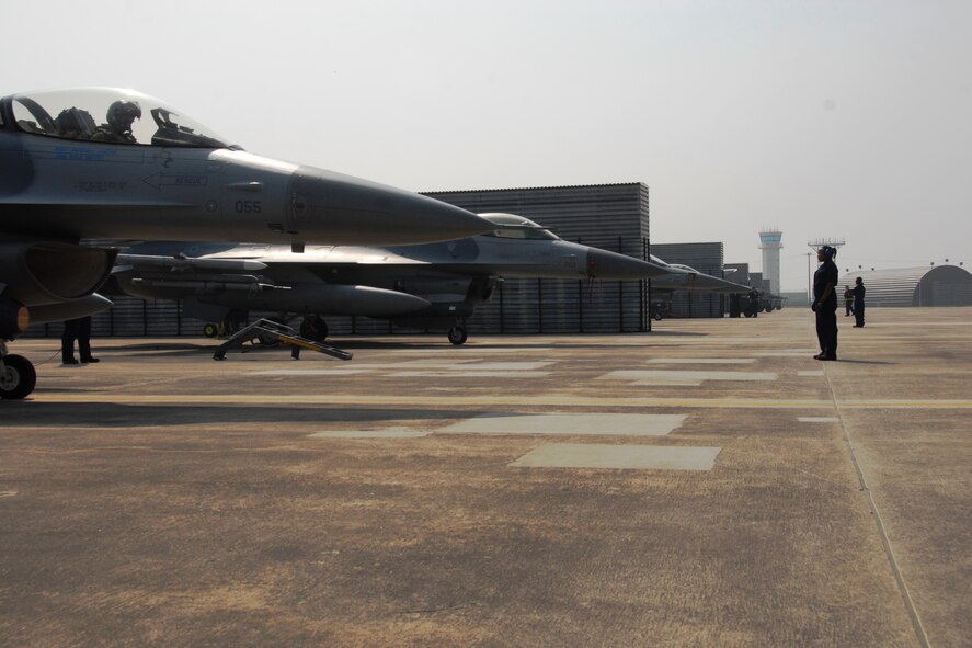 U.S. Air Force F-16 Fighting Falcon aircraft prepare to take off Oct. 18 at Kwangju Air Base, Republic of Korea, during exercise Max Thunder 10-02. (U.S. Air Force photo/Staff Sgt. Eric Burks)
