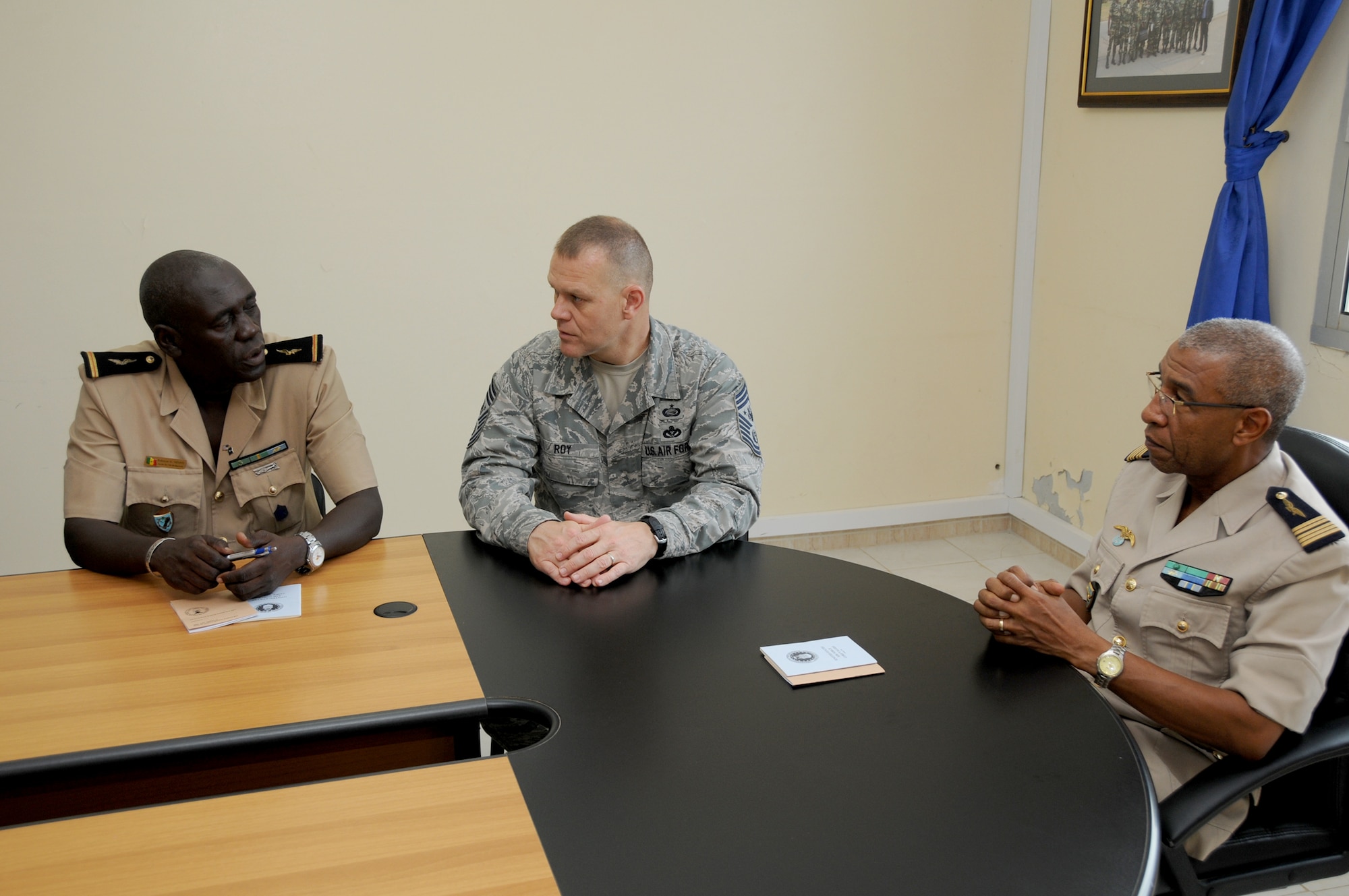 Chief Master Sgt. of the Air Force James A. Roy meets with the Senegalese air force's top leaders during an office call Oct. 15, 2010, in Dakar, Senegal. He discussed enlisted force development with their adjutant chief, Warrant Officer 1 Babacar Ndiaye (left) and chief of staff, Col. Alain Pereira. This was his third stop on a visit to Africa. (U.S. Air Force photo/Master Sgt. Jim Fisher)
