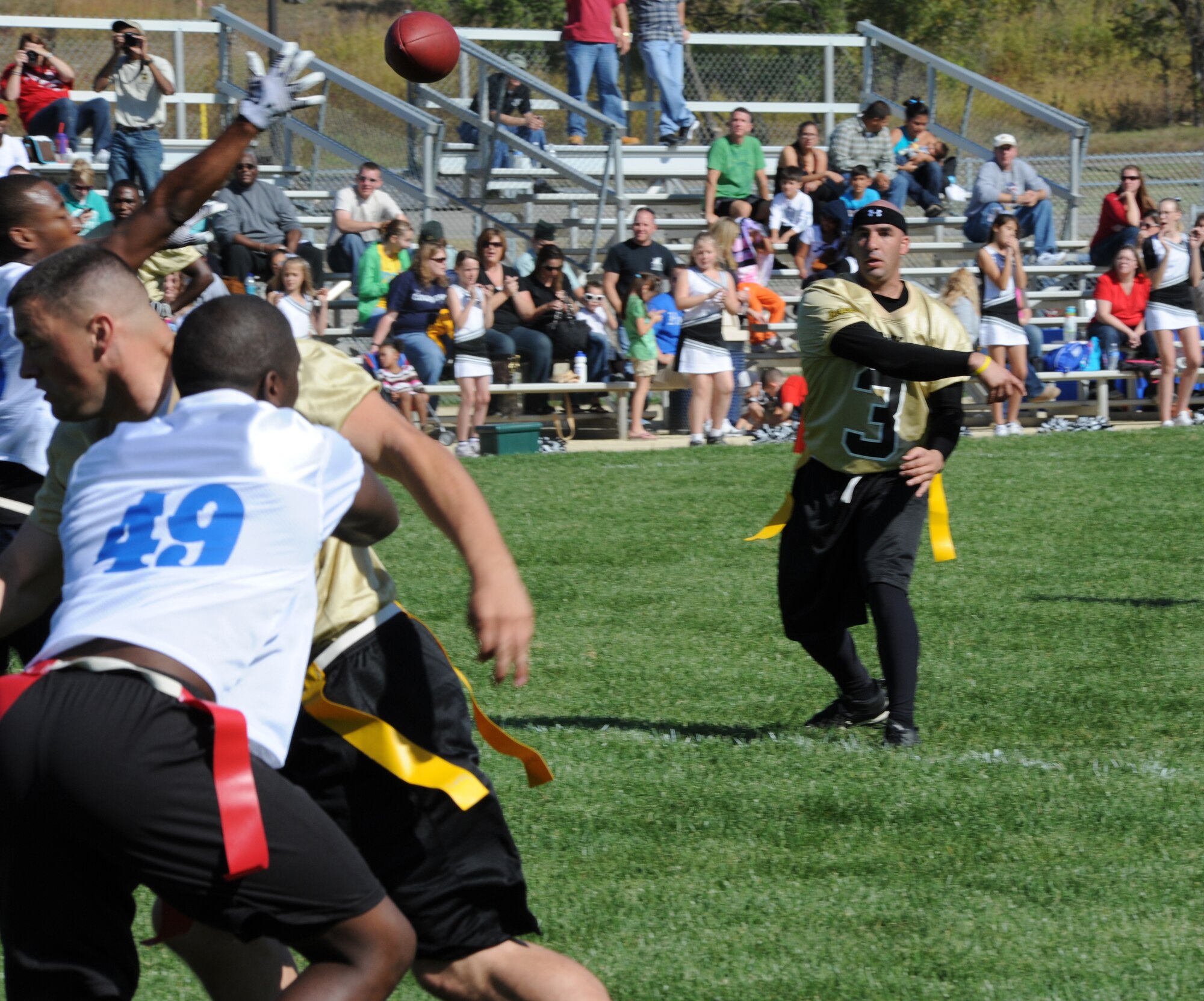 Fort Riley quarterback Jason Lafasciano throws the ball for a first down Oct. 16, 2010, in a flag football game against McConnell’s Airmen at Fort Riley, Kan. The game was the second contest between the two teams; the Airmen and Soldiers will face off again in 2011. (U.S. Air Force photo/Airman 1st Class Armando A. Schwier-Morales)