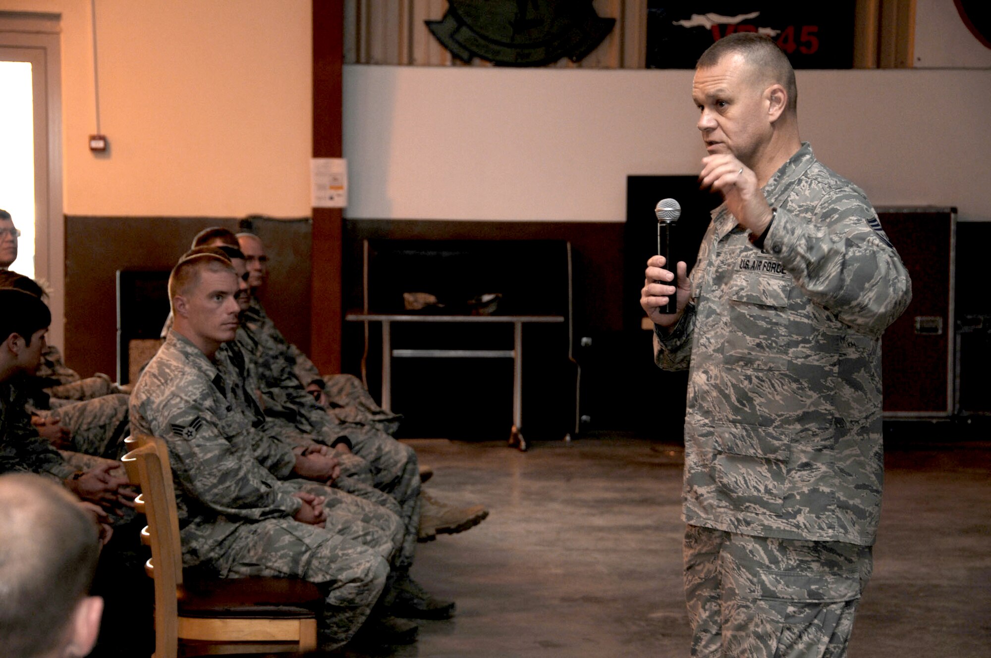 Chief Master Sgt. of the Air Force James A. Roy speaks to Airmen at an enlisted call Oct. 13, 2010, at Camp Lemonnier, Djibouti. During the call, Chief Roy explained his office?s main focus areas: being ready for joint and coalition operations, deliberate development and building resiliency. (U.S. Air Force photo/Master Sgt. James Fisher)