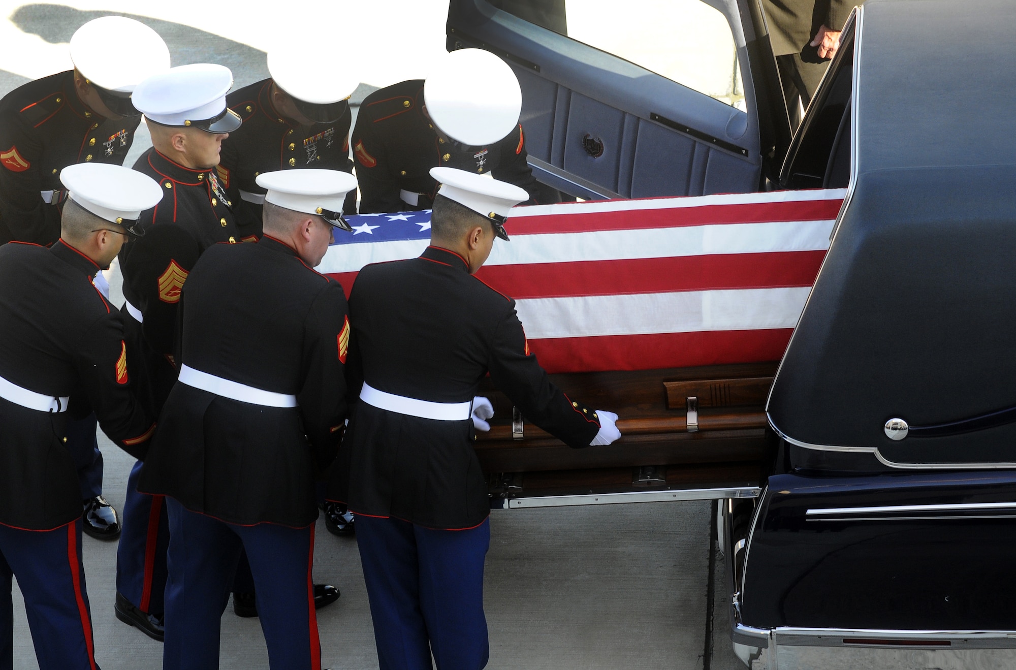 A United States Marine Corps honor guard transfers  Corporal Stephen "Coty" Sockalosky from an aircraft to an awaiting hearse at Robins Oct. 13. Cpl. Sockalosky was killed in action on Oct. 6 while supporting combat operations in Afghanistan. U. S. Air Force photo by Sue Sapp