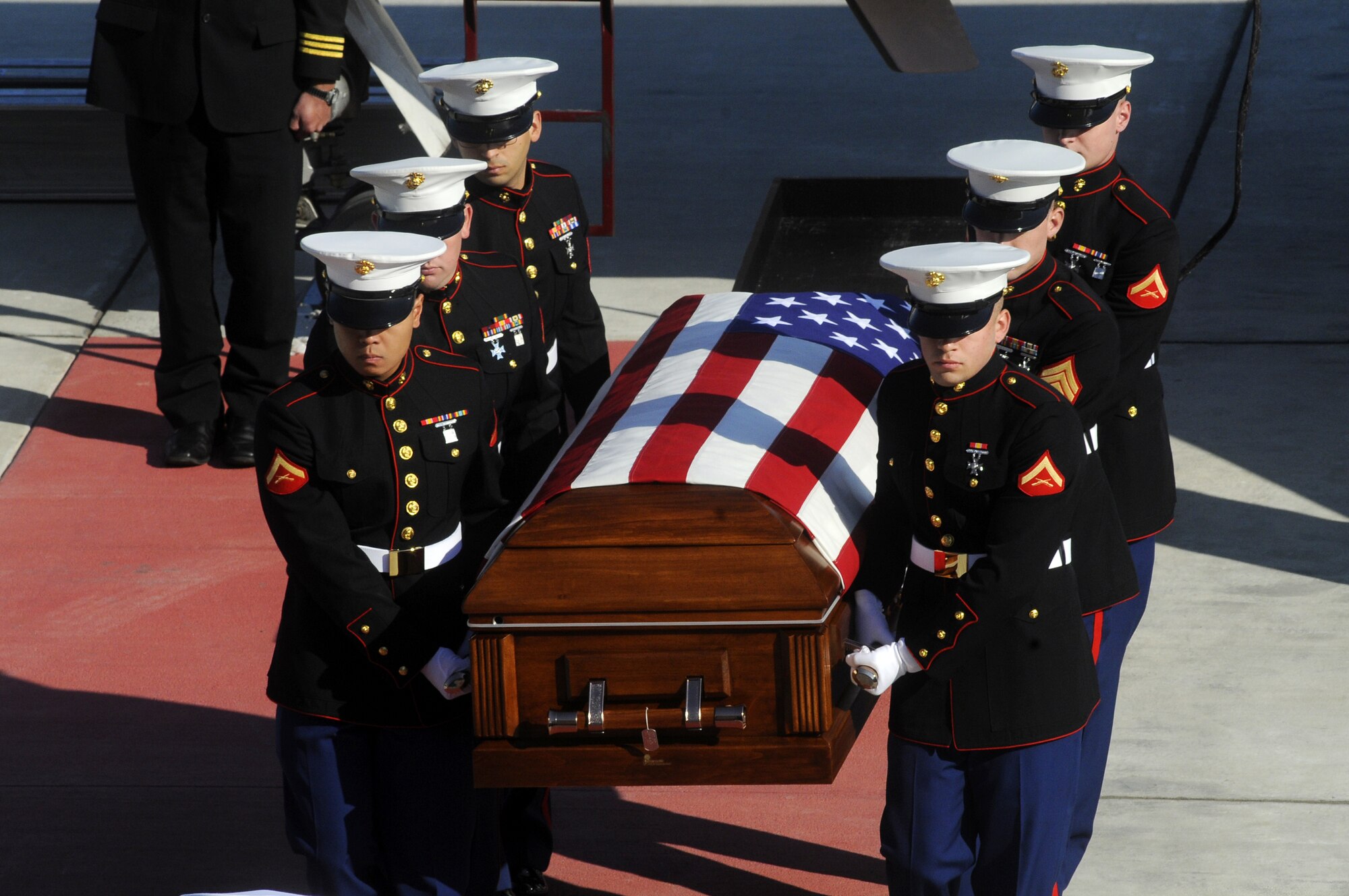 A United States Marine Corps honor guard transfers  Corporal Stephen "Coty" Sockalosky from an aircraft to an awaiting hearse at Robins Oct. 13. Cpl. Sockalosky was killed in action on Oct. 6 while supporting combat operations in Afghanistan. U. S. Air Force photo by Sue Sapp