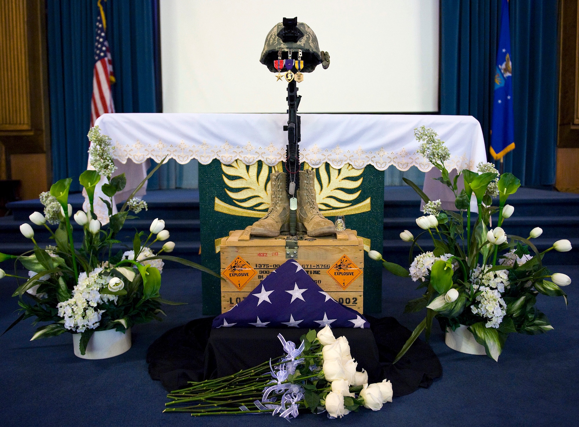 NELLIS AIR FORCE BASE, Nev. – Hundreds of people gathered Oct. 15 at the base chapel for a memorial service for Senior Airman Michael Buras. Senior Airman Buras was an Explosive Ordinance Disposal Journeyman assigned to the 99th Civil Engineers Squadron. Airman Buras was killed in action while deployed to Afghanistan and responding to an Improvised Explosive Device Sept. 21. (U.S. Air Force photo by Senior Airman Brett Clashman) 