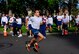 Airman 1st Class Michael Ramirez, 627th Air Base Group Communications Squadron, sprints across the finish line, coming in first place for the 1.5 mile run portion of the 62nd Airlift Wing Fitness Challenge Oct. 15 at Joint Base Lewis-McChord, Wash. (U.S. Air Force Photo/Amn Leah Young)