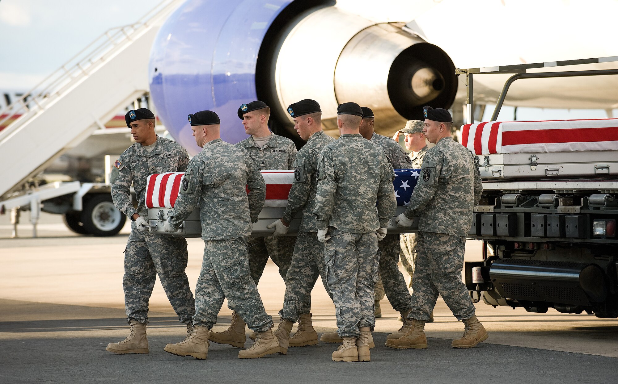 A U.S. Army carry team transfers the remains of Army Pfc. Tramaine J. Billingsley of Portsmouth, Va., at Dover Air Force Base, Del., Oct. 15, 2010. Billingsley was assigned to the 7th Squadron, 10th Cavalry Regiment, 1st Brigade Combat Team, 4th Infantry Division, Fort Carson, Colo. (U.S. Air Force photo/Jason Minto)
