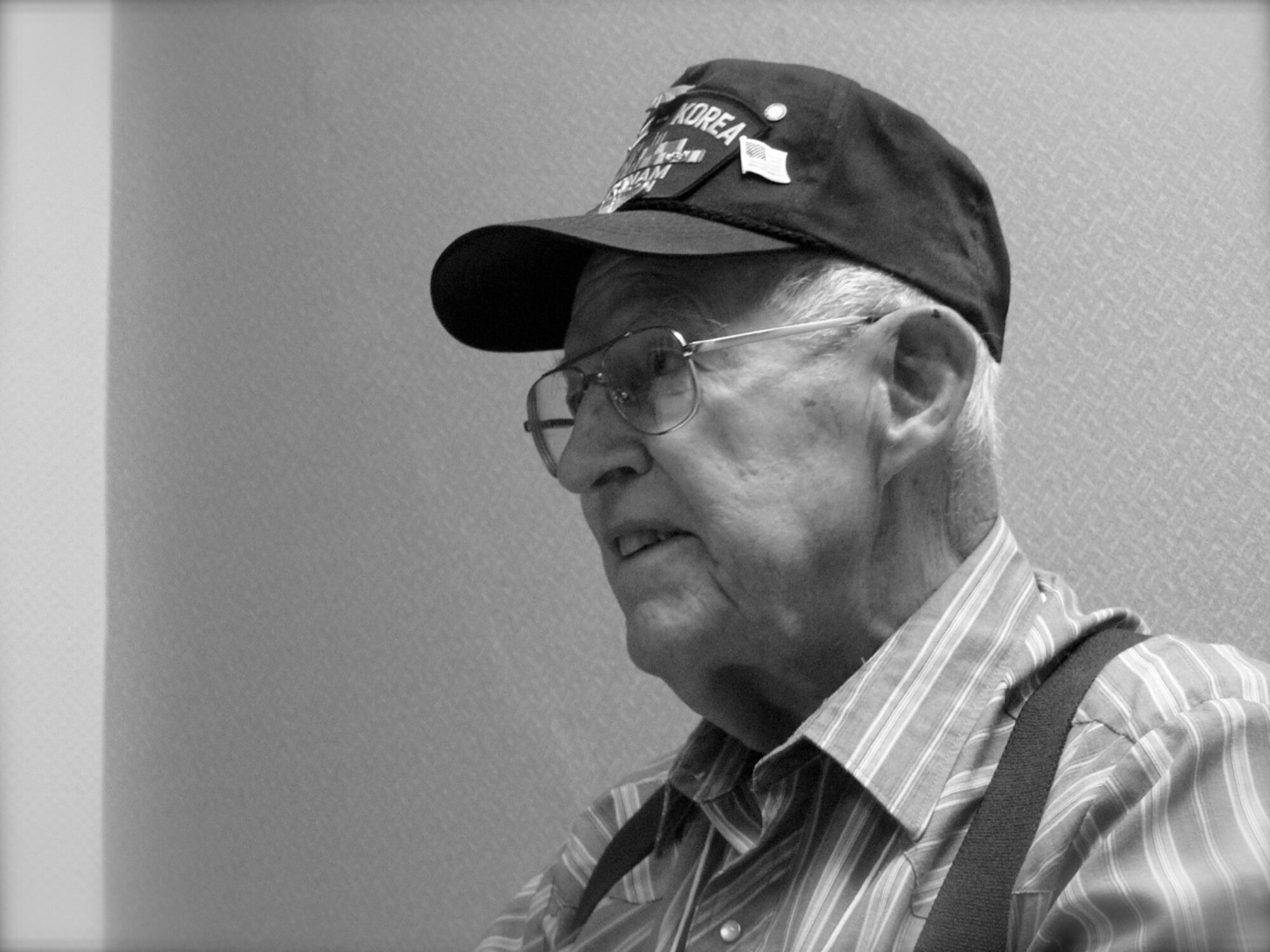 Retired Maj. Harold “Cowboy” Lee, 86, who flew the F-86 Sabre, tells stories about flying in and out of Chambley Air Base in eastern France during the 21st Fighter Bomber Wing reunion Sept. 16-19 in Colorado Springs. Major Lee said he was one of the few pilots with 60 to 75 hours flying time a month, “I didn’t feel there was anything I couldn’t fly.” (U.S. Air Force photo/Monica Mendoza)